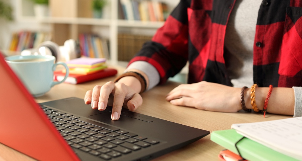 Person Studying Laptop Unlocked