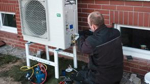 Man Installing Heat Pump Unlocked Shutterstock Dziurek (1)