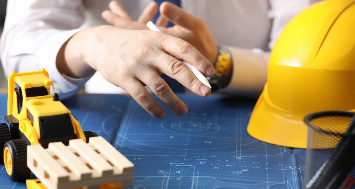 Construction Manager Blueprints Planning Unlocked H Ko Shutterstock